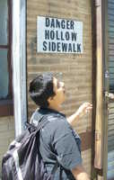  17 Sumana demonstrates the hollow sidewalk.JPG 